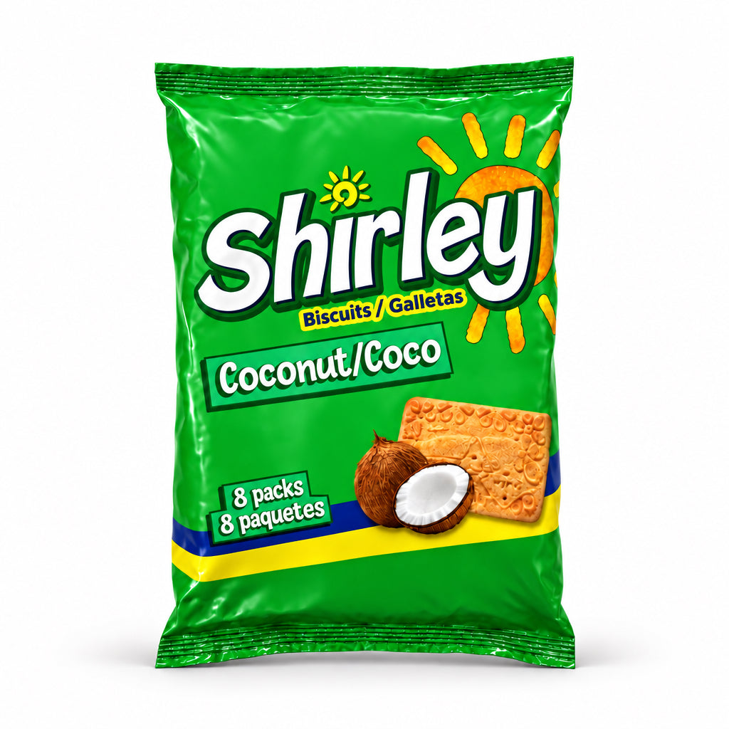 A green bag of Wibisco Shirley Biscuits Coconut/Coco, featuring the brand name 'Shirley' in large white letters, a coconut and biscuit illustration, and '8 pack' and '8 paquetes' text, photographed on a wood-grain surface.