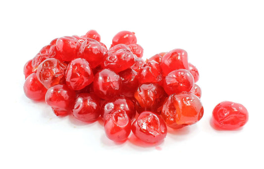A vibrant pile of glazed cherries, showcasing their rich color and shiny sugary glaze, perfect for desserts and baking.
