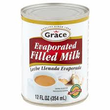 Grace Evaporated Milk 12oz can, perfect for enriching Caribbean dishes and desserts with creamy texture.